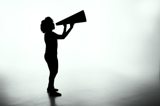 person with megaphone